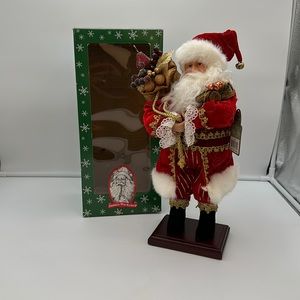 Santa’s Workshop Santa with a Gold Bag filled with Fruit on wood base